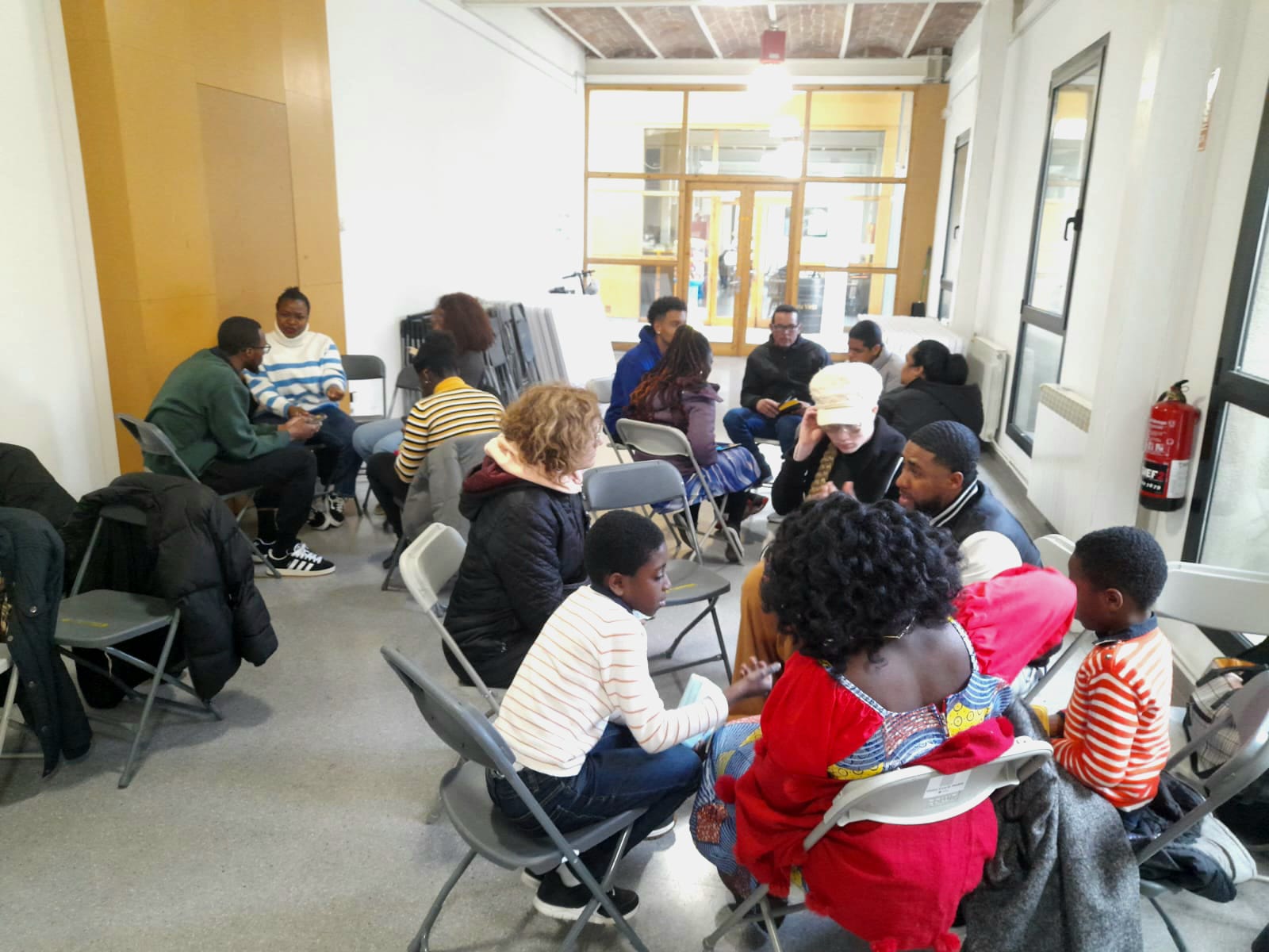 People Wearing White Shirts Getting Baptized in a Sea